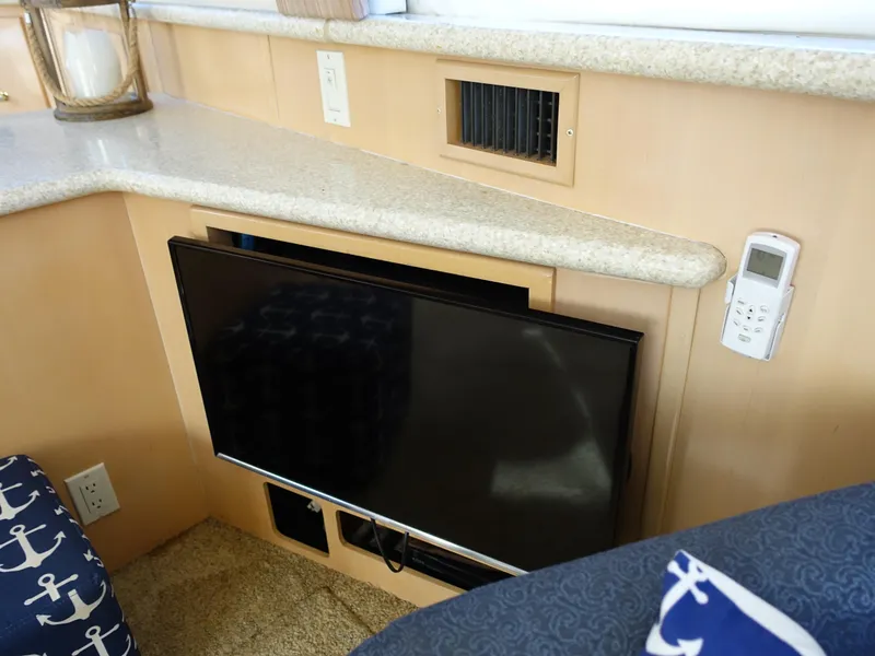 Slide: The Image of Flat-screen TV in 2000 Carver 406 Aft Cabin Motor Yacht interior. - 6