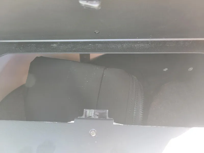 Slide: The Image of Storage compartment of 2024 Four Winns H1 OB boat. - 44