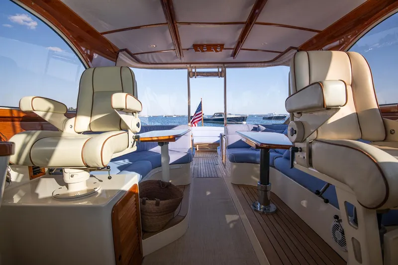 Slide: The Image of Helm of 2005 Hinckley Talaria 40 with controls and communication devices. - 12