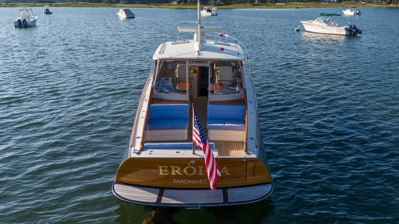 Slide: The Image of 2005 Hinckley Talaria 40 yacht bathroom with wooden cabinetry and modern fixtures. - 4