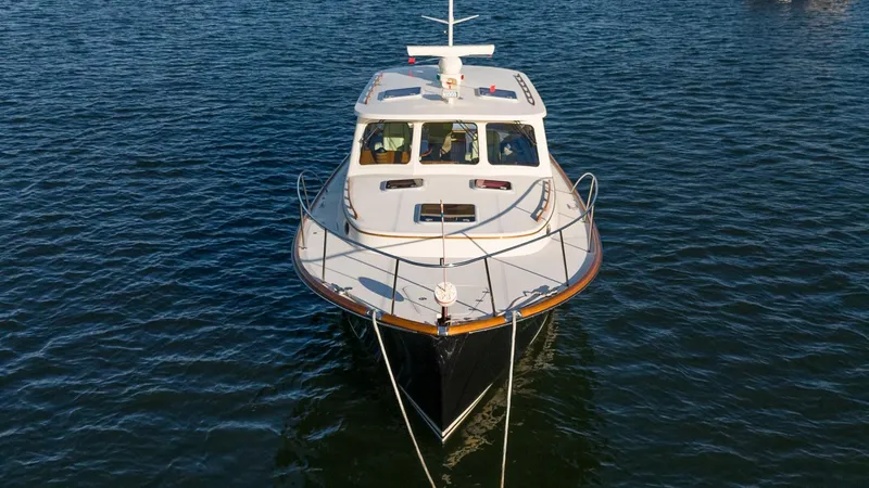 Slide: The Image of Hinckley Talaria 40 yacht, 2005 model, cruising on calm waters. - 43