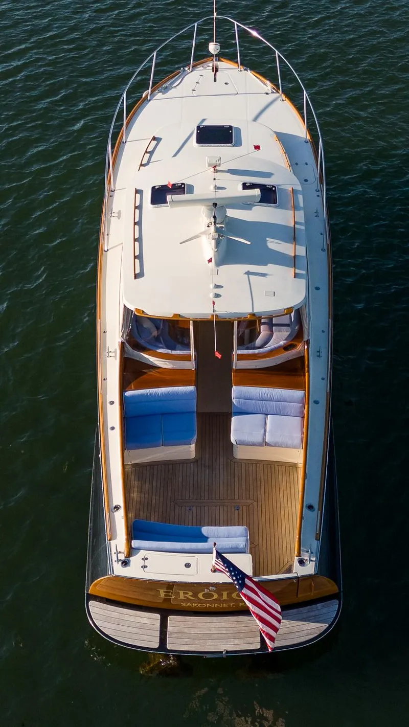 Slide: The Image of 2005 Hinckley Talaria 40 yacht, aerial view, cruising on water. - 44
