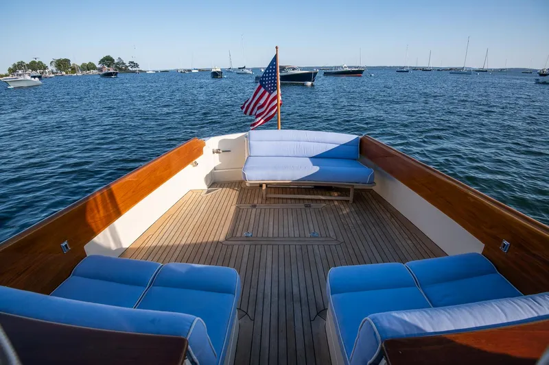 Slide: The Image of Aerial view of 2005 Hinckley Talaria 40 yacht on dark water. - 7