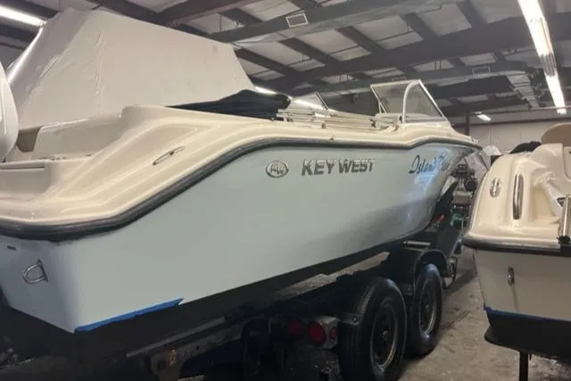 Slide: The Image of 2020 Key West 239 DFS boat in storage facility. - 5