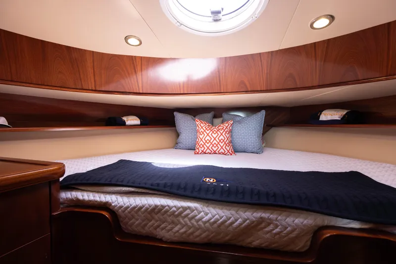 Slide: The Image of Luxurious cabin interior of 2014 San Juan Open Express Cruiser with cozy bedding. - 26