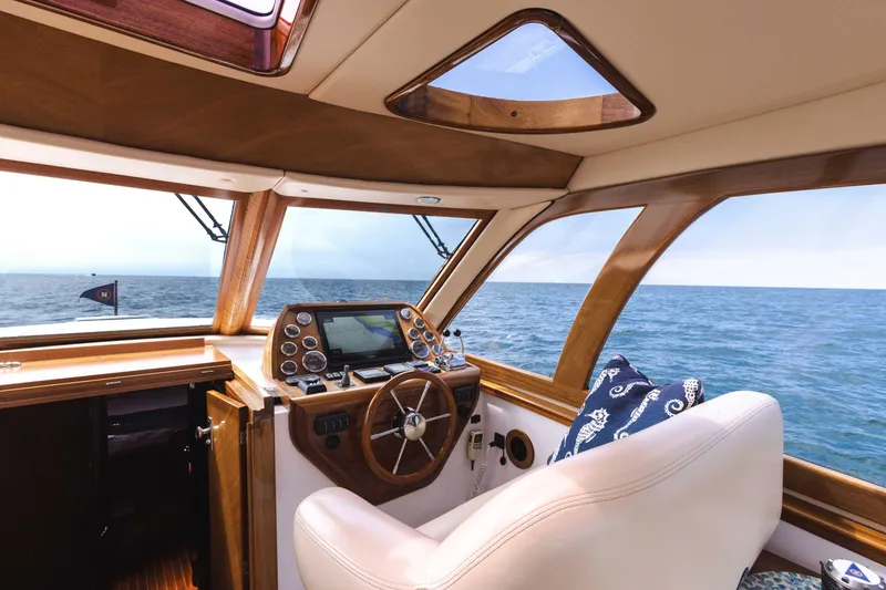 Slide: The Image of 2014 San Juan Open Express Cruiser helm with ocean view - 3