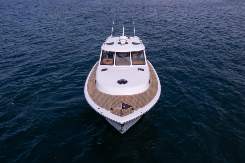 Slide: The Image of 2014 San Juan Open Express Cruiser on open water. - 39