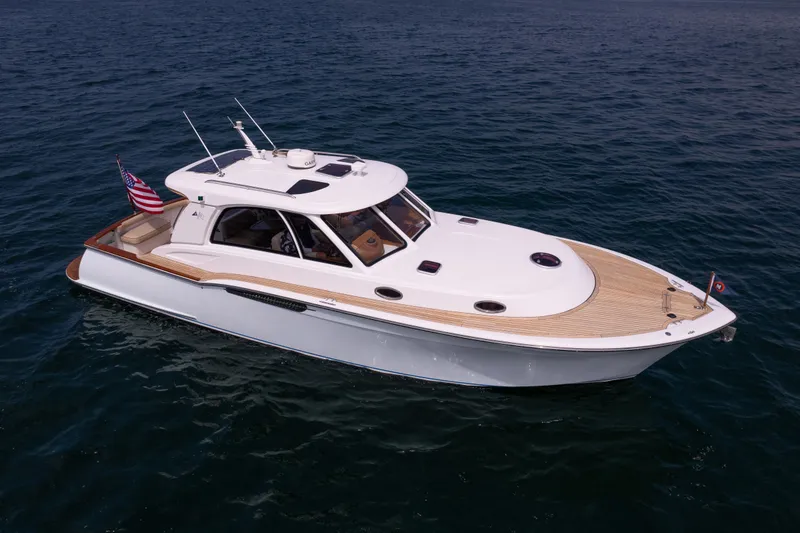 Slide: The Image of 2014 San Juan Open Express Cruiser on open water. - 44