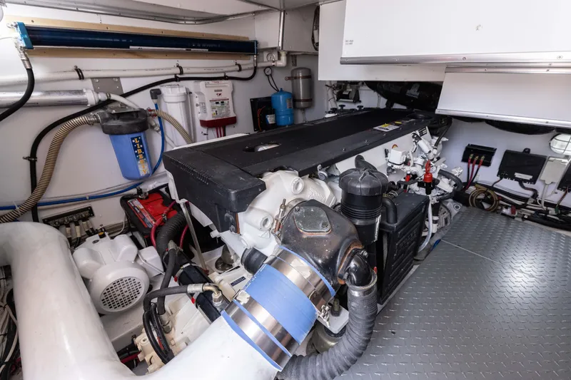 Slide: The Image of Engine room of a 2014 San Juan Open Express Cruiser with modern equipment. - 50