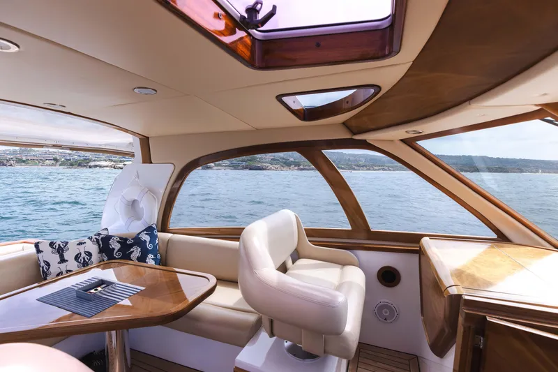 Slide: The Image of Luxurious interior of 2014 San Juan Open Express Cruiser on the water. - 6
