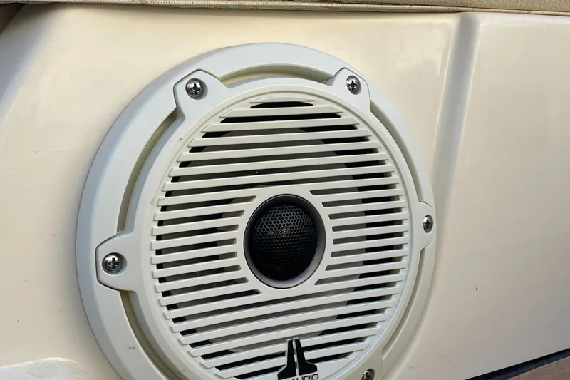 Slide: The Image of Close-up of a speaker on a 2022 Chris-Craft Launch 25 GT boat. - 12