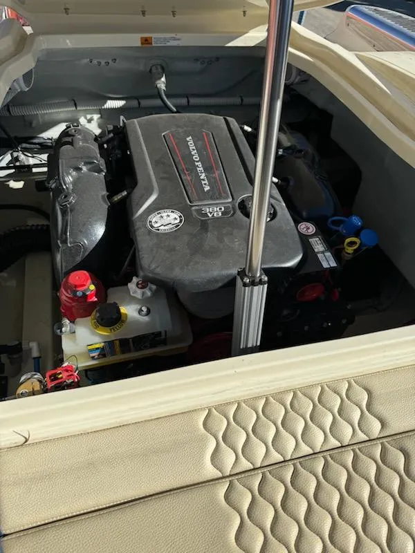 Slide: The Image of 2022 Chris-Craft Launch 25 GT engine compartment, showcasing powerful marine engine details. - 4