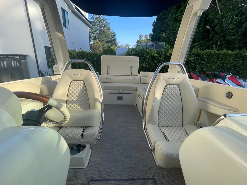 Slide: The Image of 2022 Chris-Craft Launch 25 GT interior with luxurious seating and elegant design. - 7