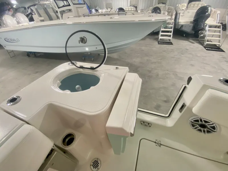 Slide: The Image of 2024 Robalo R270 boat interior with livewell and seating. - 15