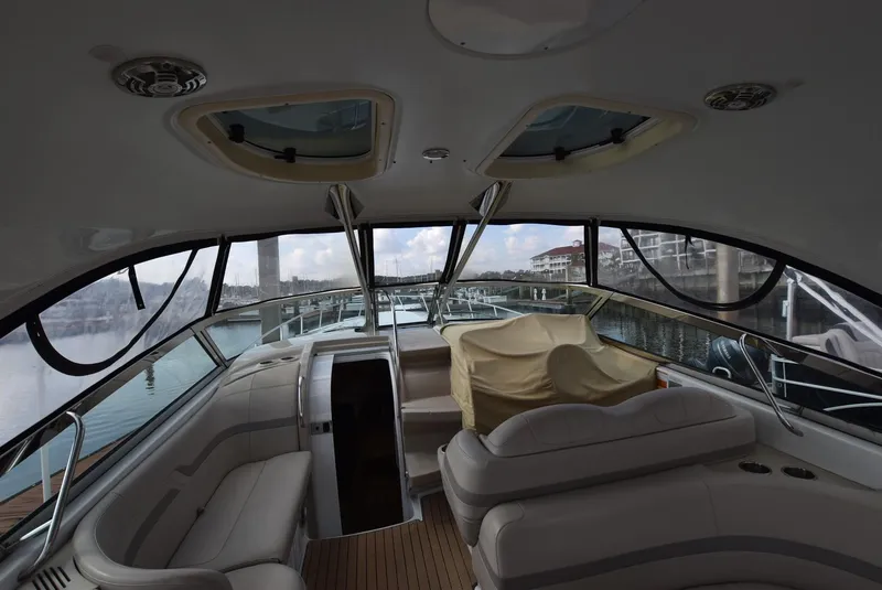Slide: The Image of Interior of a 2011 Formula 400ss yacht with luxurious seating and panoramic windows. - 6