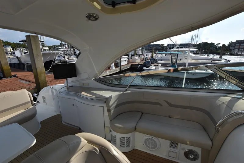 Slide: The Image of Interior view of a 2011 Formula 400ss yacht docked at a marina. - 9