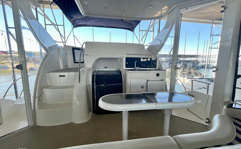 Slide: The Image of 2008 Meridian 459 Motoryacht interior with table and seating area. - 18