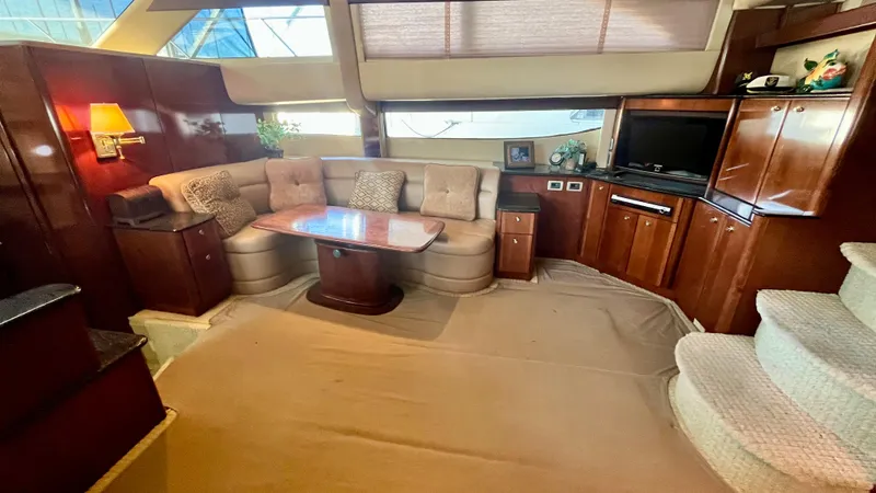 Slide: The Image of Luxurious interior of a 2008 Meridian 459 Motoryacht with plush seating and entertainment area. - 28