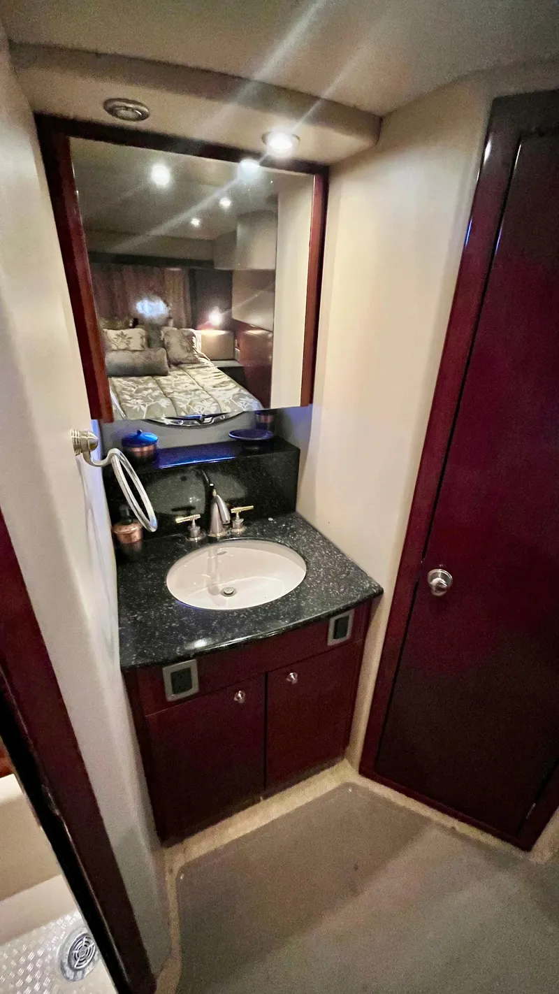 Slide: The Image of 2008 Meridian 459 Motoryacht bathroom with sink and mirror. - 40
