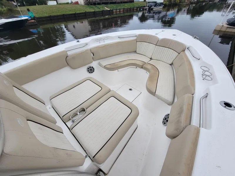Slide: The Image of 2016 Sea Fox 266 Commander boat with spacious seating and cup holders. - 12