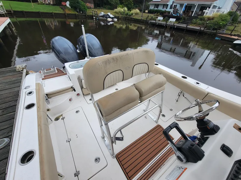 Slide: The Image of 2016 Sea Fox 266 Commander boat interior with dual outboard motors. - 9