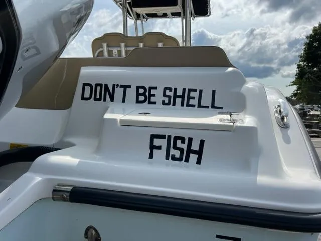 Slide: The Image of 2020 Key West 239 FS boat with Don't Be Shell Fish text on the stern. - 3