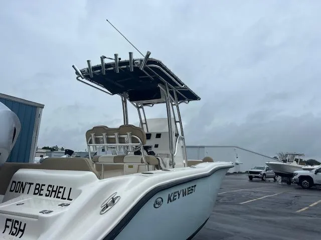 Slide: The Image of 2020 Key West 239 FS boat in a parking lot on a cloudy day. - 4