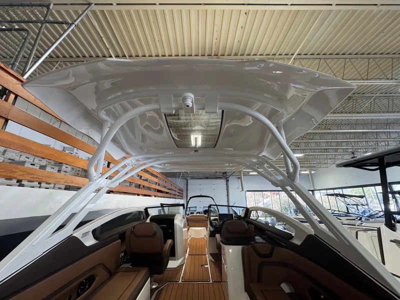 Slide: The Image of 2024 Yamaha Boats 275 SD interior view, showcasing sleek design and spacious seating. - 8