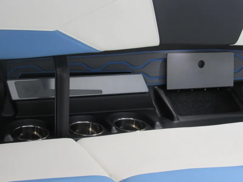 Slide: The Image of 2024 Malibu 23 LSV interior with cup holders and sleek design. - 14