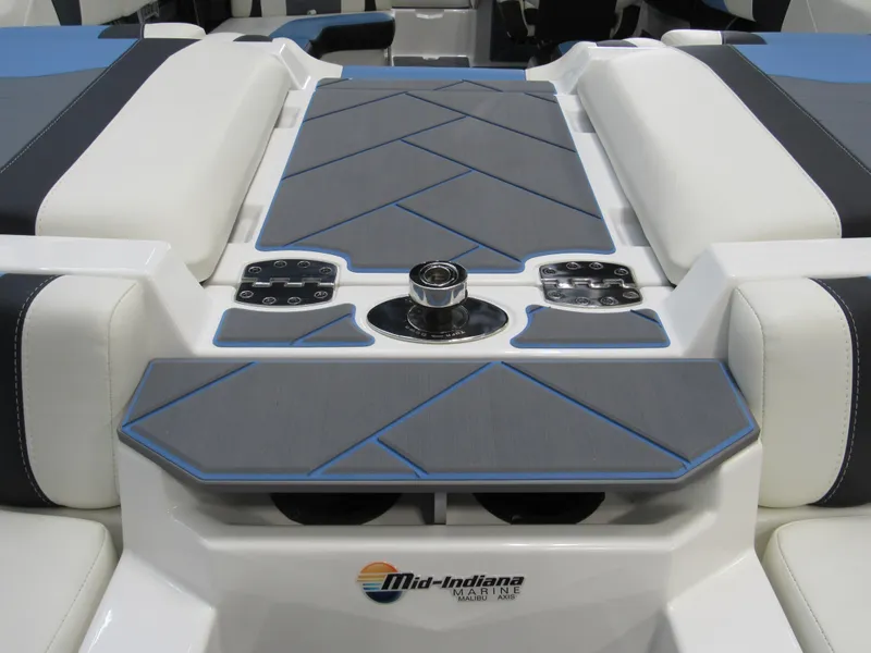 Slide: The Image of 2024 Malibu 23 LSV boat interior with sleek seating and modern design. - 20