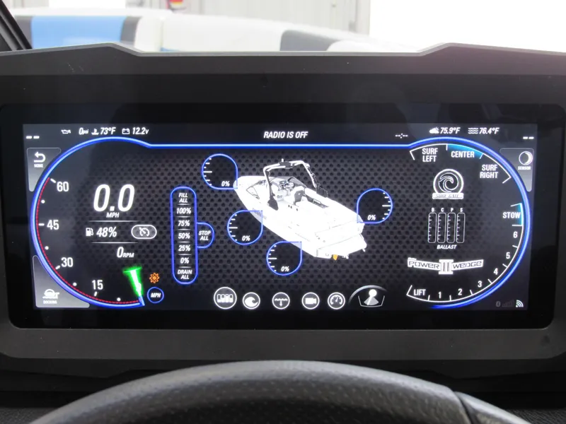 Slide: The Image of Dashboard display of 2024 Malibu 23 LSV boat with various controls and indicators. - 25