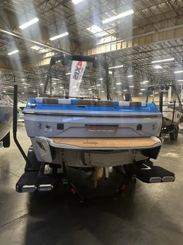 Slide: The Image of 2023 Axis Wake Research A225 boat in a warehouse setting. - 6