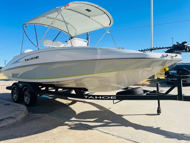 Slide: The Image of 2024 Tahoe 2150 CC boat on trailer with canopy, side view. - 3