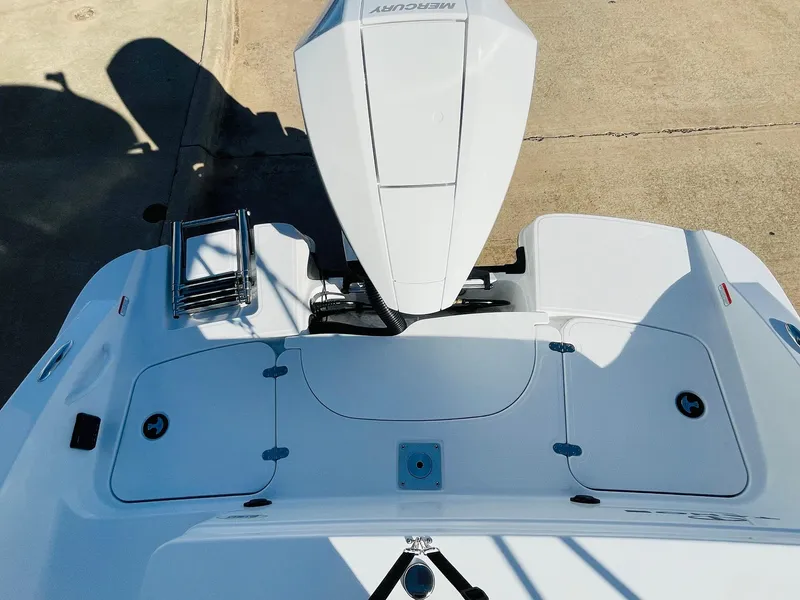 Slide: The Image of 2024 Tahoe 2150 CC boat stern with Mercury outboard motor. - 38