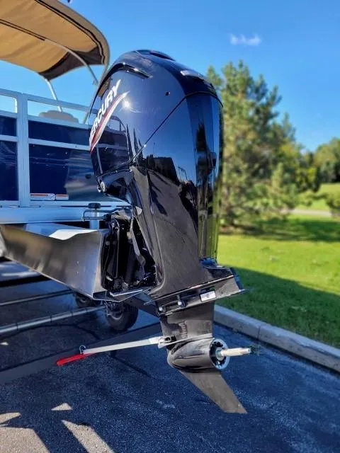 Slide: The Image of 2024 Sun Tracker Fishin' Barge 20 DLX with Mercury outboard motor. - 2