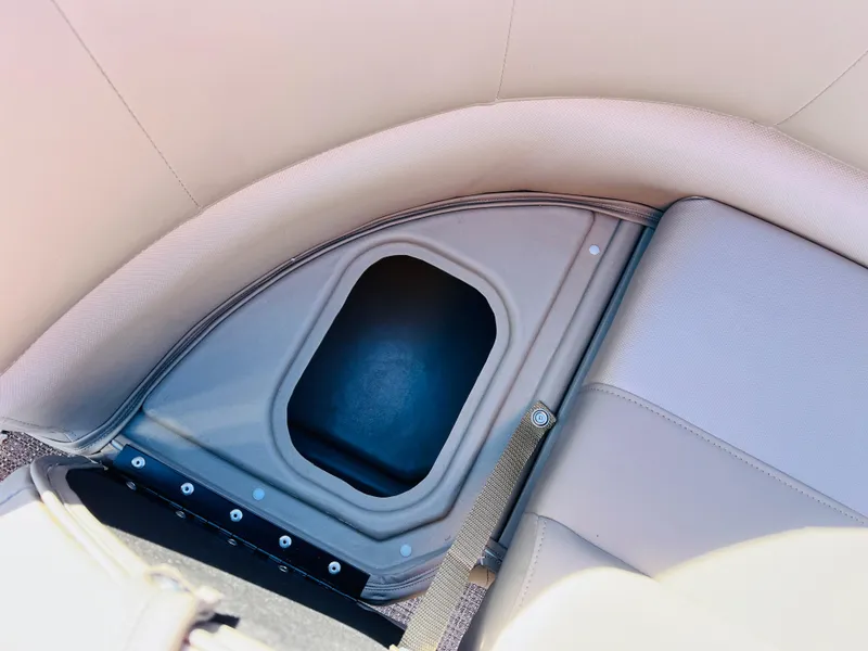 Slide: The Image of 2024 Ranger Reata 200C boat seat storage compartment. - 22