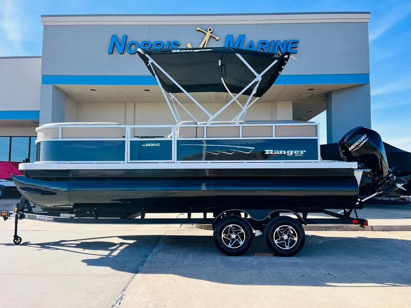 Slide: The Image of 2024 Ranger Reata 200C pontoon boat at Norris Marine dealership. - 30