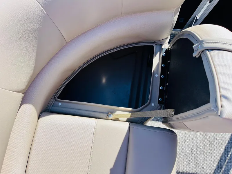 Slide: The Image of 2024 Ranger Reata 200C boat seat storage compartment. - 44