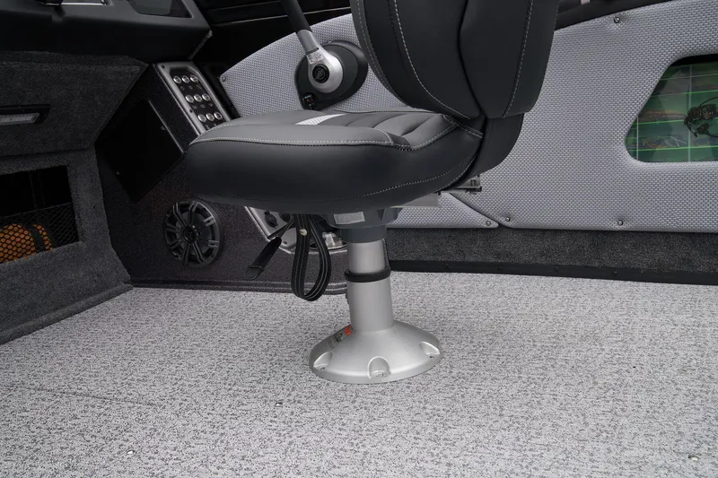 Slide: The Image of 2024 Ranger VX1888 WT boat interior with captain's chair and control panel. - 59