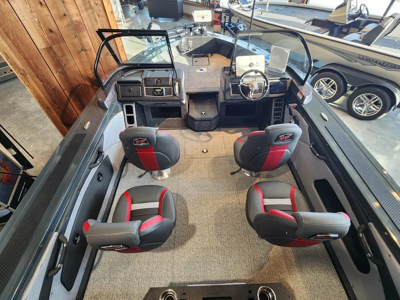 Slide: The Image of 2024 Ranger VX1888 WT boat interior with four seats and modern dashboard. - 6