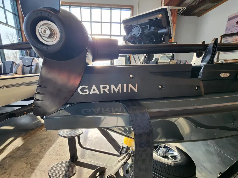 Slide: The Image of 2024 Ranger VX1888 WT boat with Garmin equipment in a showroom. - 8