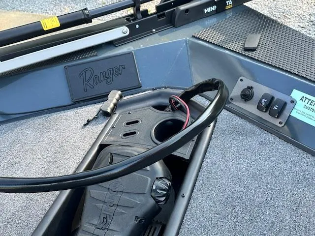 Slide: The Image of 2024 Ranger RT178 boat interior with control panel and wiring. - 8