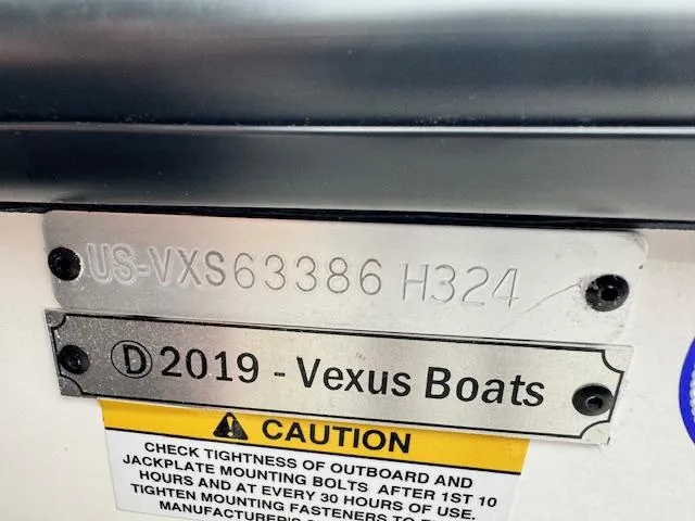 Slide: The Image of 2024 Vexus DVX20S boat identification plate with caution label. - 5