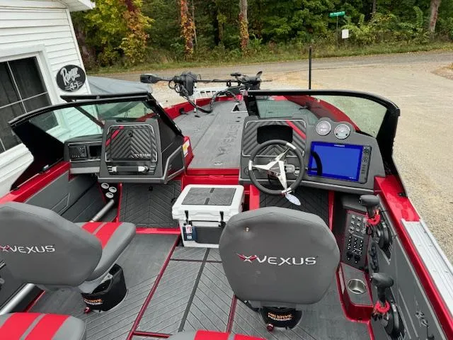 Slide: The Image of 2024 Vexus DVX20S boat interior with modern dashboard and seating. - 7