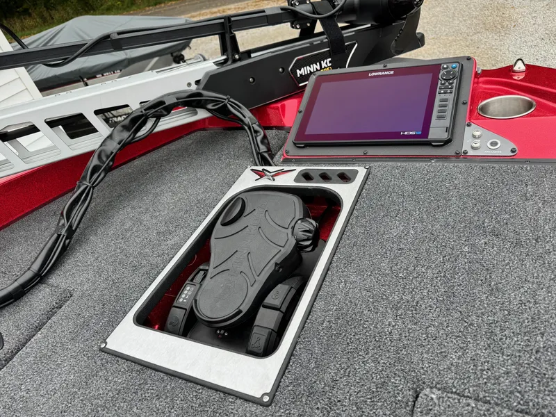 Slide: The Image of 2024 Vexus DVX20S boat dashboard with foot pedal and navigation screen. - 8