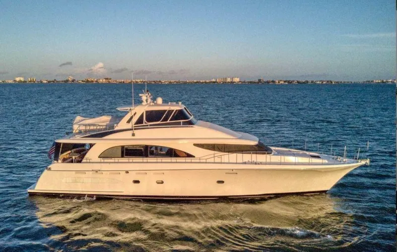 Slide: The Image of 1998 Cheoy Lee 81 Motor Yacht cruising on open water. - 1