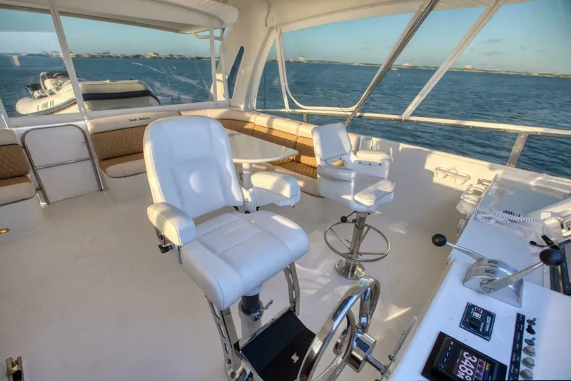 Slide: The Image of Luxurious helm station of 1998 Cheoy Lee 81 Motor Yacht with panoramic ocean views. - 12