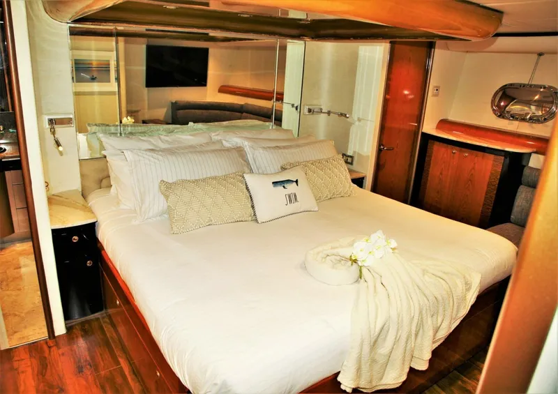 Slide: The Image of Luxurious bedroom in 1998 Cheoy Lee 81 Motor Yacht with elegant decor. - 7