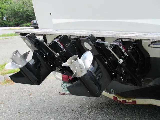 Slide: The Image of 1973 Formula Thunderbird 26 boat with dual outboard motors and stainless steel propellers. - 3