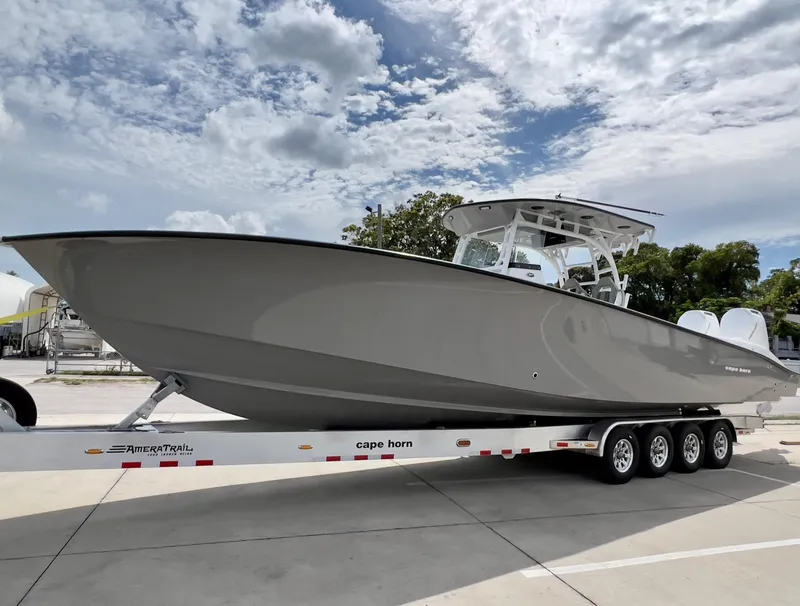 The Image of 2025 Cape Horn 39 T boat on trailer under cloudy sky. - 0